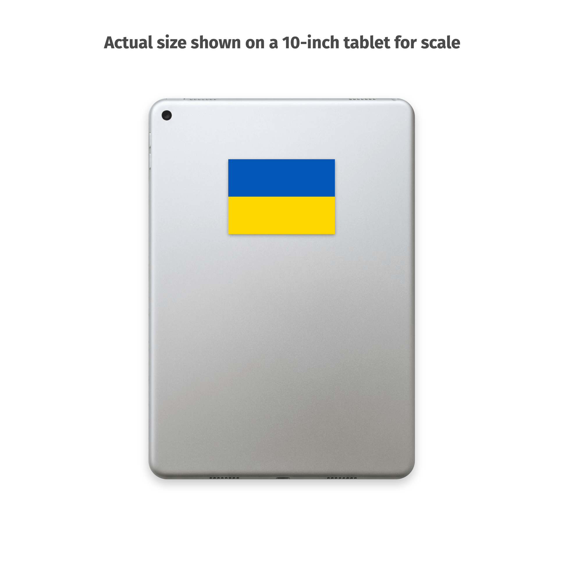 A silver tablet shown from the back with a blue and yellow Ukrainian flag sticker centered on the upper half. Text above reads, 'Actual size shown on a 10-inch tablet for scale.