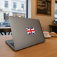Laptop with a British flag sticker on a wooden table in a cafe setting