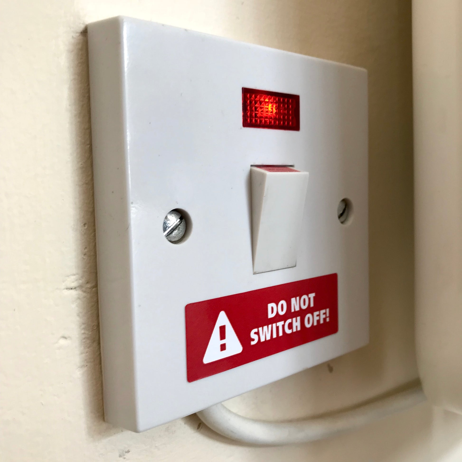 Do Not Switch Off Sticker by Gobrecht & Ulrich on Plug Sample Photo